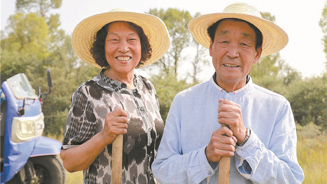 “時代楷?！睆堖B?。簶s譽的背后，離不開妻子的默默支持